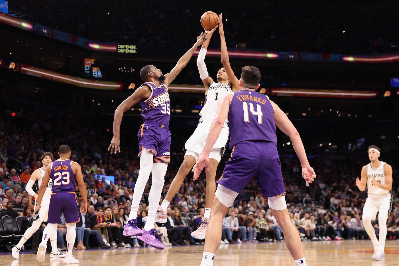 Victor Wembanyama of the San Antonio Spurs attempts a shot over Kevin Durant of the Phoenix Suns during the first half of an NBA game at Footprint Center on Thursday in Phoenix, Arizona. (GETTY IMAGES NORTH AMERICA /AFP)