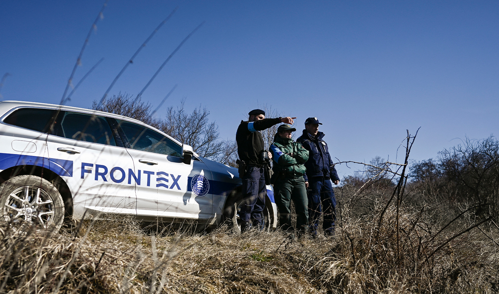 A Serbian border police officer and members of European Border and Coast Guard Agency Frontex patrol on the Bulgaria-Serbia border, near the Serbian border village of Gradina, on February 17, 2023. (AFP/File)