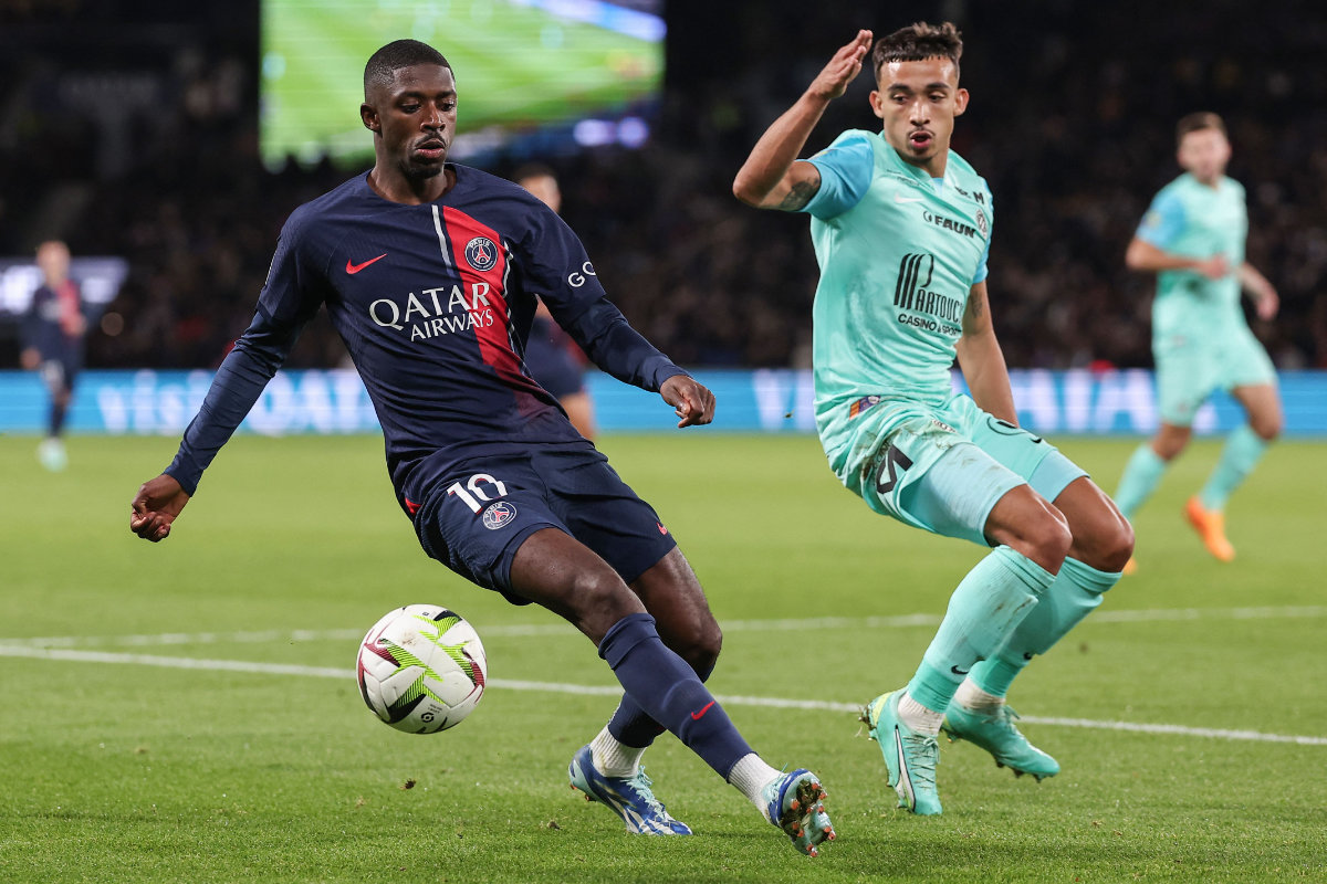 Paris Saint-Germain's French forward Ousmane Dembele (L) and Montpellier's French defender Theo Sainte-Luce during the French L1 football match between Paris Saint-Germain (PSG) and Montpellier Herault SC at The Parc des Princes Stadium in Paris on Friday. (AFP)