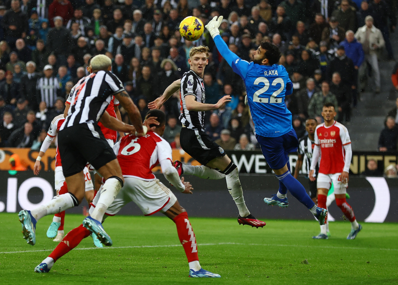 Newcastle United's Anthony Gordon in action with Arsenal's David Raya during their Premier League football match on Saturday at St. James Park, Newcastle. (Reuters)