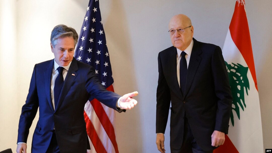 U.S. Secretary of State Antony Blinken gestures towards Lebanon's caretaker prime minister Najib Mikati during a day of meetings amid the ongoing conflict between Israel and Hamas, in the Jordanian capital Amman on November 4, 2023. (File/AFP)