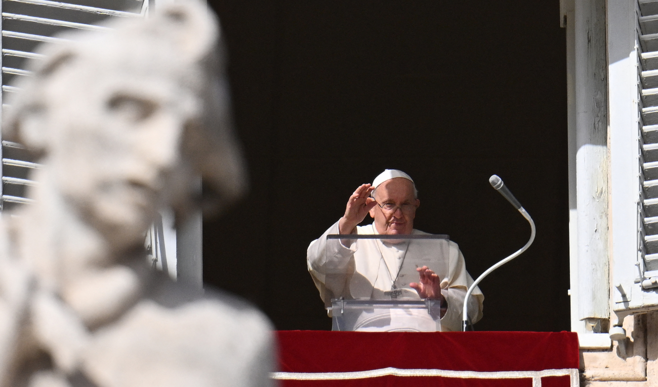 Pope Francis waves from the window of the apostolic palace overlooking St. Peter’s square during the weekly Angelus prayer on November 05, 2023 in The Vatican. (AFP)