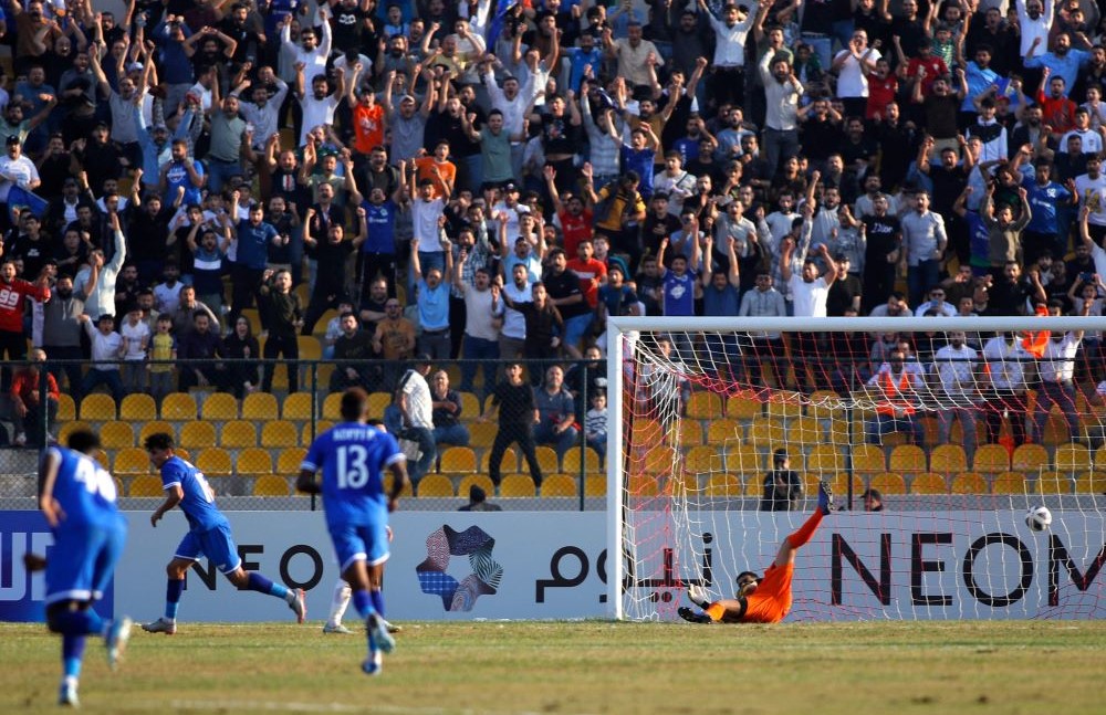 Al-Quwa Al-Jawiya’s Ali Jasim, 2nd left, celebrates scoring during the AFC Champions League Group C match against Saudi’s Al-Ittihad at the Franso Hariri Stadium in Irbil, Nov. 6, 2023. (AFP)
