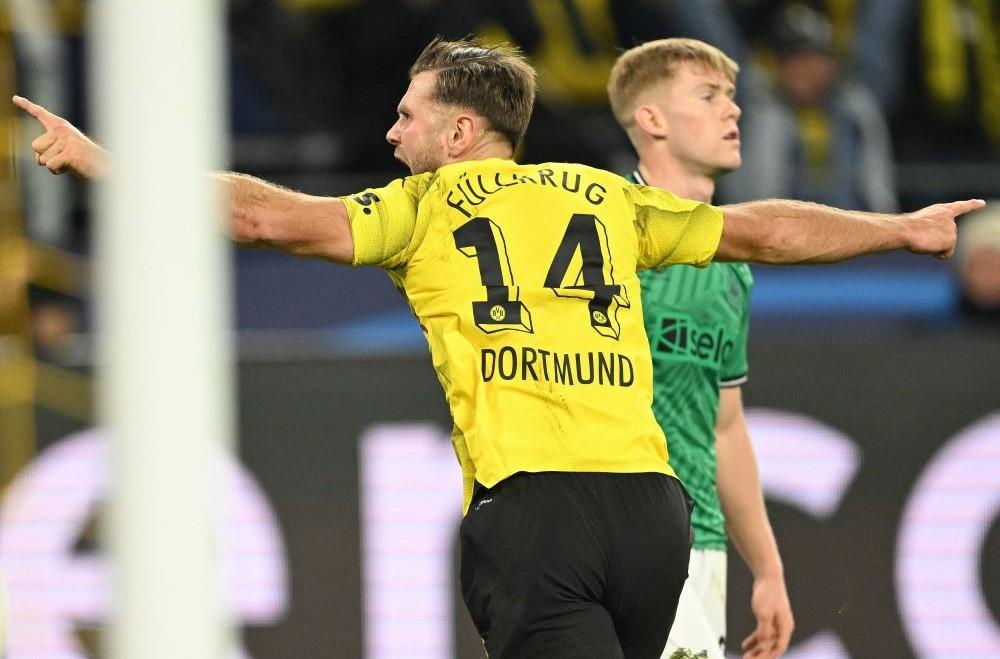 Borussia Dortmund’s German forward Niclas Fuellkrug celebrates scoring the opening goal against Newcastle United, Dortmund, Germany, Nov. 7, 2023. (AFP)