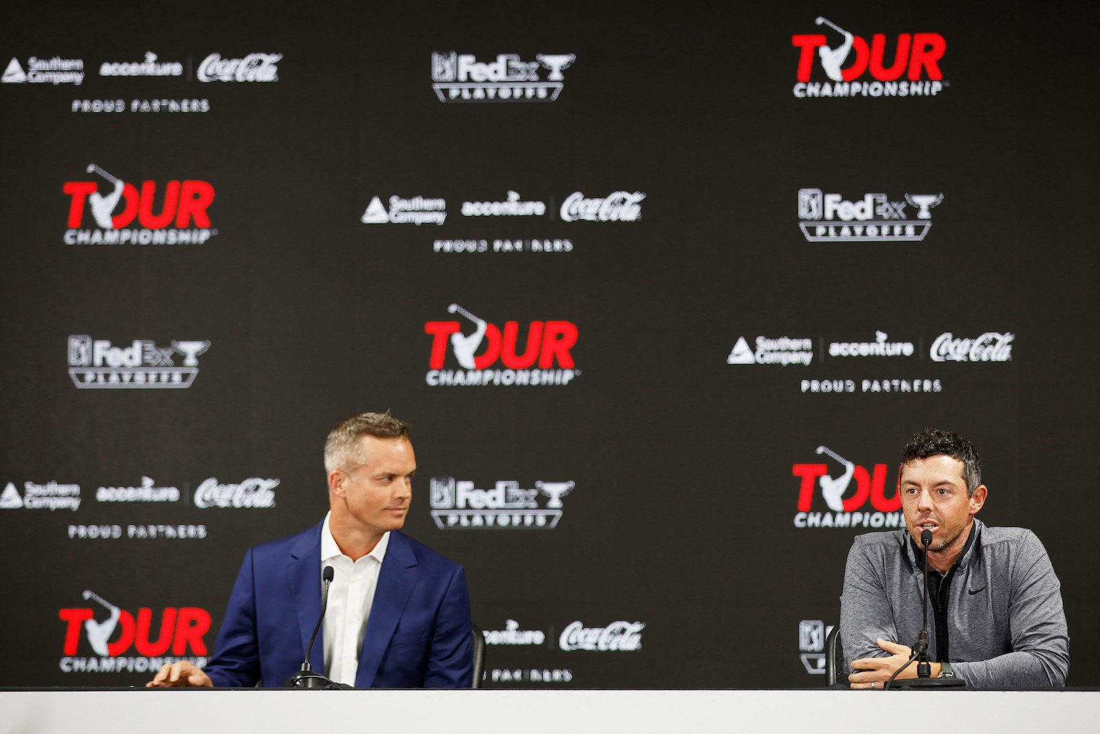 Mike McCarley, founder and CEO of TMRW Sports, and Rory McIlroy of Northern Ireland during a press conference prior to the TOUR Championship on Aug. 24, 2022 in Atlanta, Georgia. TMRW Sports is the sports and entertainment company behind TGL. (File/Getty Images via AFP)