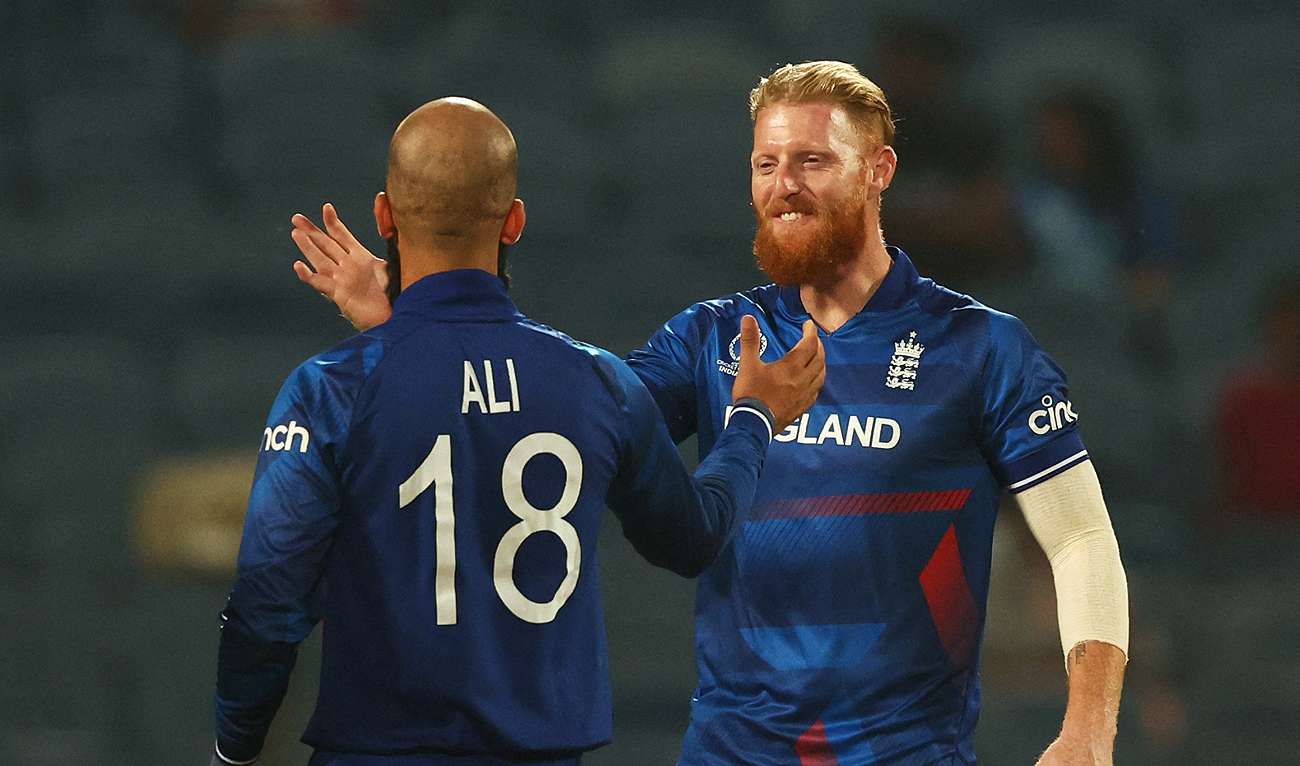 England's Moeen Ali celebrates with Ben Stokes after the match the ICC Men's Cricket World Cup match between England and Netherlands in Pune, India, Wednesday, Nov. 8, 2023. (REUTERS)