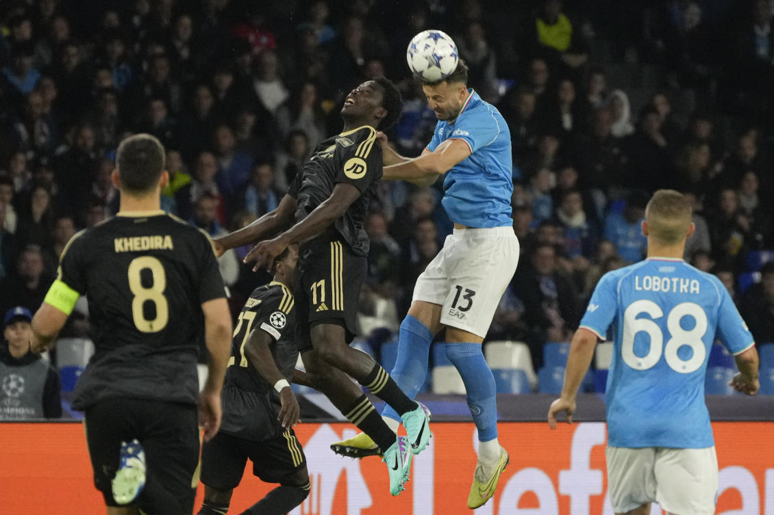 Napoli’s Amir Rrahmani jumps for a header with Union’s David Datro Fofana during their Champions League, Group C, match at the Diego Maradona stadium, in Naples on Nov. 8, 2023. (AP)