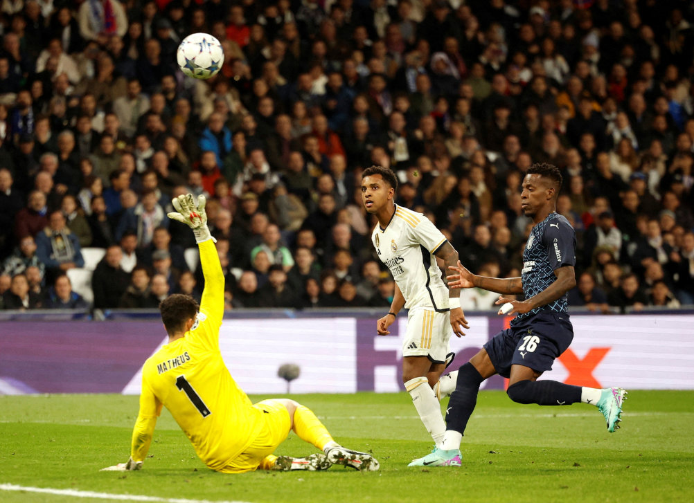 Real Madrid's Rodrygo scores their third goal during the Champions League Group C football match against S.C. Braga at Santiago Bernabeu in Madrid Wednesday. (Reuters)
