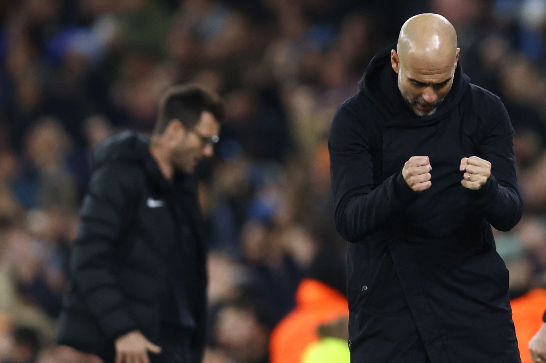 Manchester City's Spanish manager Pep Guardiola (R) after the opening goal during the UEFA Champions League Group B second leg football match between Manchester City and Young Boys at the Etihad Stadium in Manchester. (File/AFP)