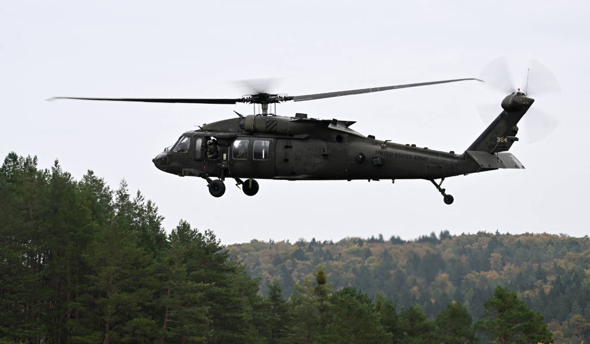 An Apache helicopter takes off from the air field during the US army Europe and Africa-directed exercise Combined Resolve 19 at the Hohenfels trainings area, southern Germany, on October 24, 2023. (AFP)