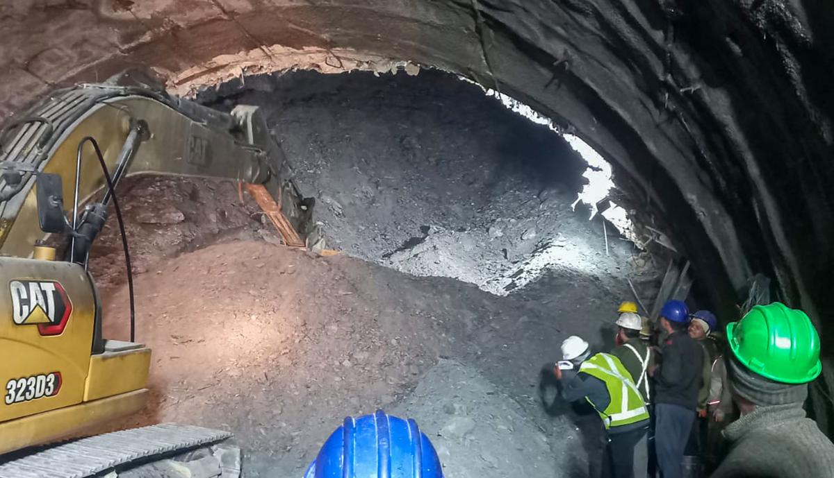 The tunnel, which was being built on a national highway that is part of a Hindu pilgrimage route, caved in around 5:30 a.m. on Sunday. (AFP)