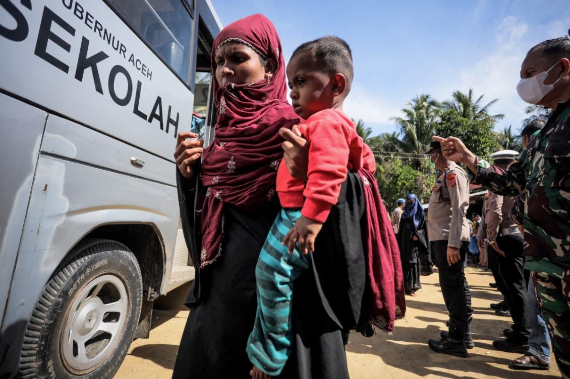 Rohingya refugees are transported to a refugee camp from Matang Pasi village, Bireun district, Aceh province on October 16, 2023, after received a medical check up and breakfast. (File/AFP)