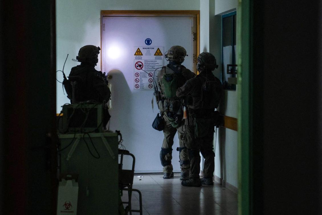 This handout picture released by the Israeli army on Nov. 15, 2023, reportedly shows Israeli soldiers carrying out operations inside Al-Shifa hospital, amid continuing battles Israel and the Palestinian militant group Hamas. (AFP)