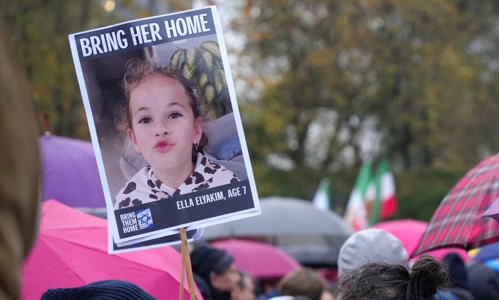 A placard reads "Bring her home" during a demonstration in support of Israel and its hostages held by the Palestinian group Hamas, amid the ongoing conflict between Israel and Hamas, in Frankfurt, Germany, November 17, 2023. (Reuters)