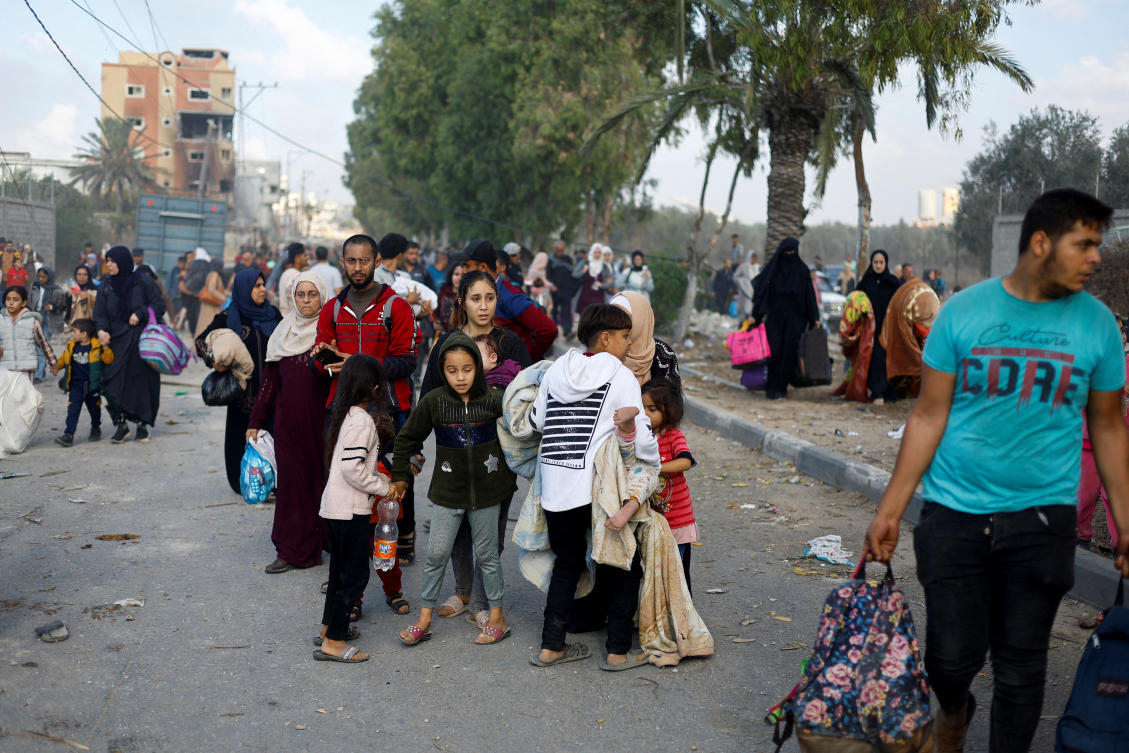 Palestinians fleeing north Gaza move southward, as Israeli tanks roll deeper into the enclave, in the central Gaza Strip on Nov. 18, 2023. (Reuters)