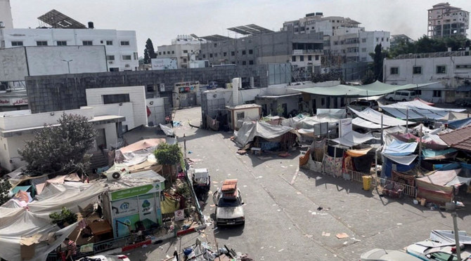 Tents and shelters used by displaced Palestinians stand at the yard of Al Shifa hospital during the Israeli ground operation around the hospital, in Gaza City. (REUTERS/File)