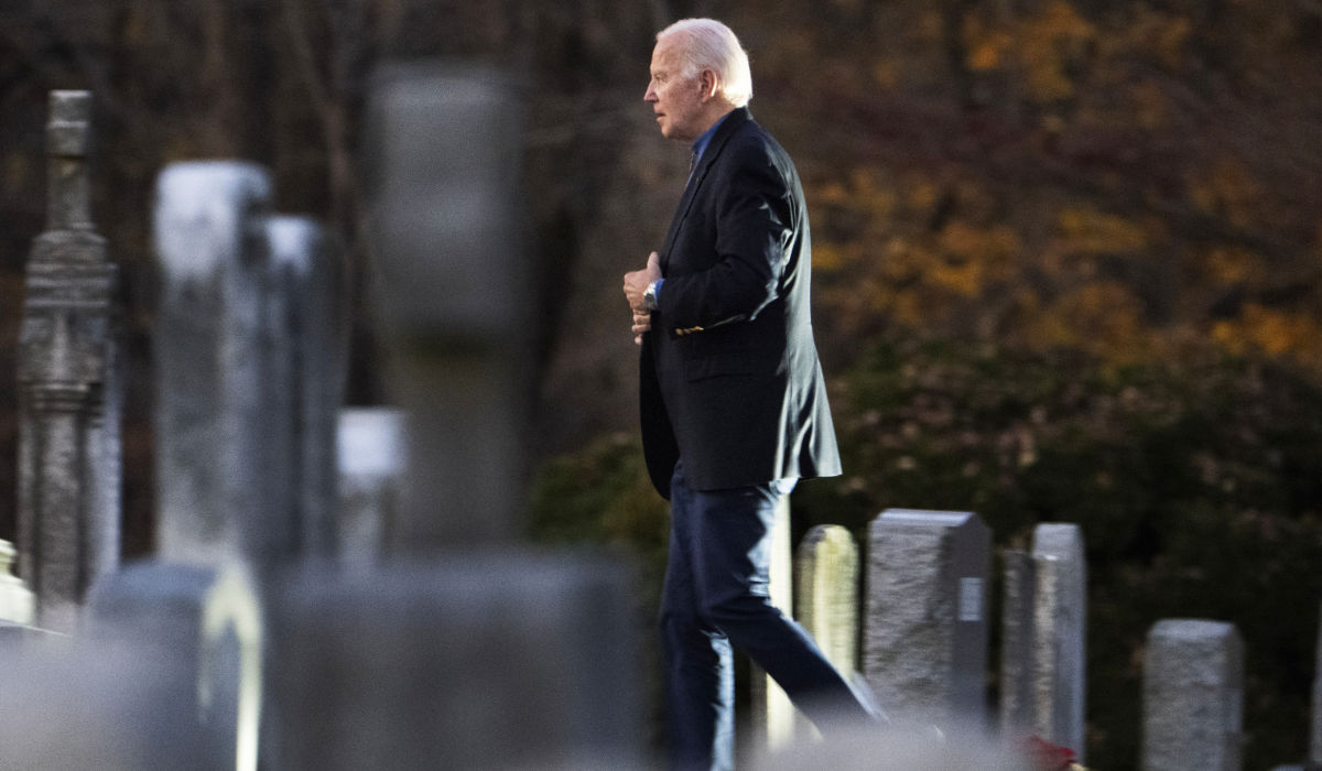 President Joe Biden walks between tombstones as he arrives at St. Joseph on the Brandywine Catholic Church in Wilmington, Del., to attend Mass, Saturday, Nov. 18, 2023. (AP)
