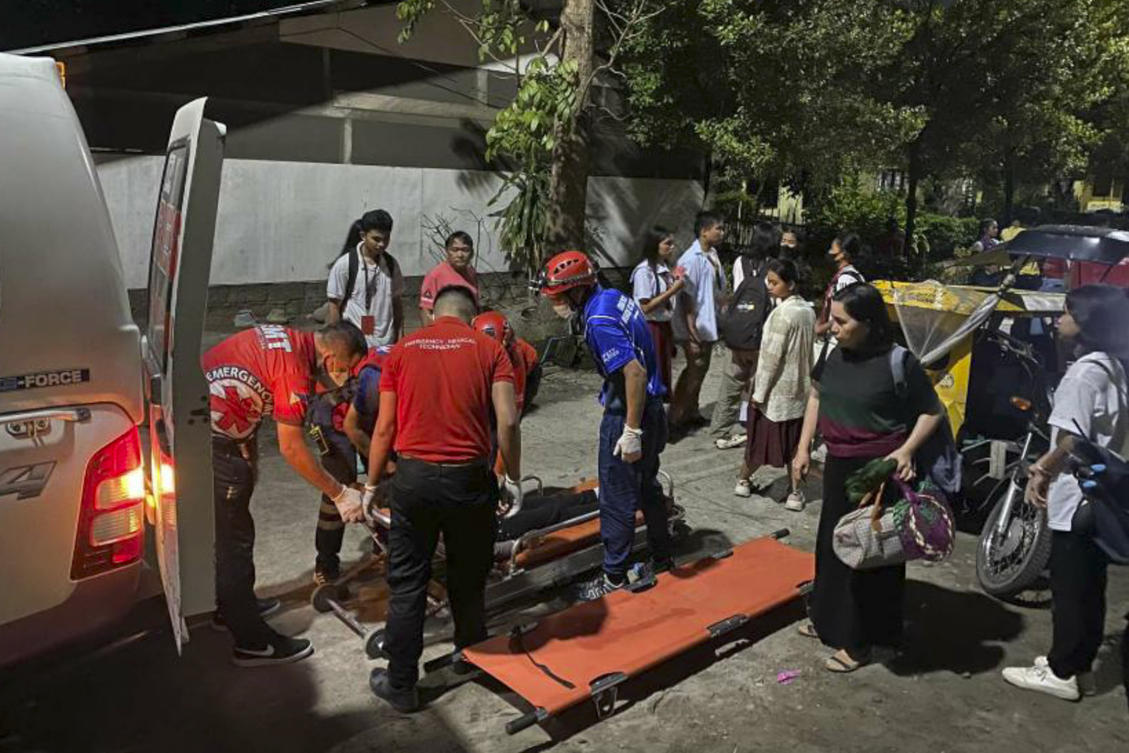 Above, volunteers attend to people affected by an earthquake that struck southern Philippines on Nov. 17, 2023. (Philippine Red Cross via AP)