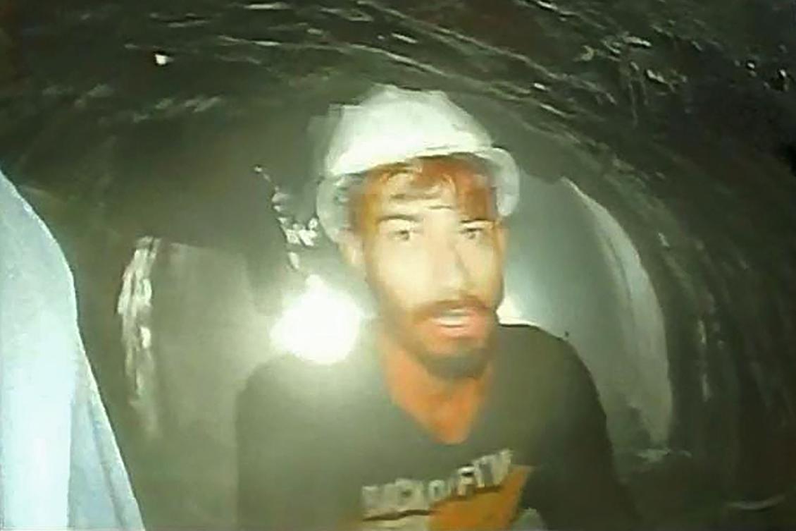 Above, a worker trapped inside the under-construction tunnel is seen through an endoscopic camera on November 21, 2023. (Department of Information and Public Relation via AFP)