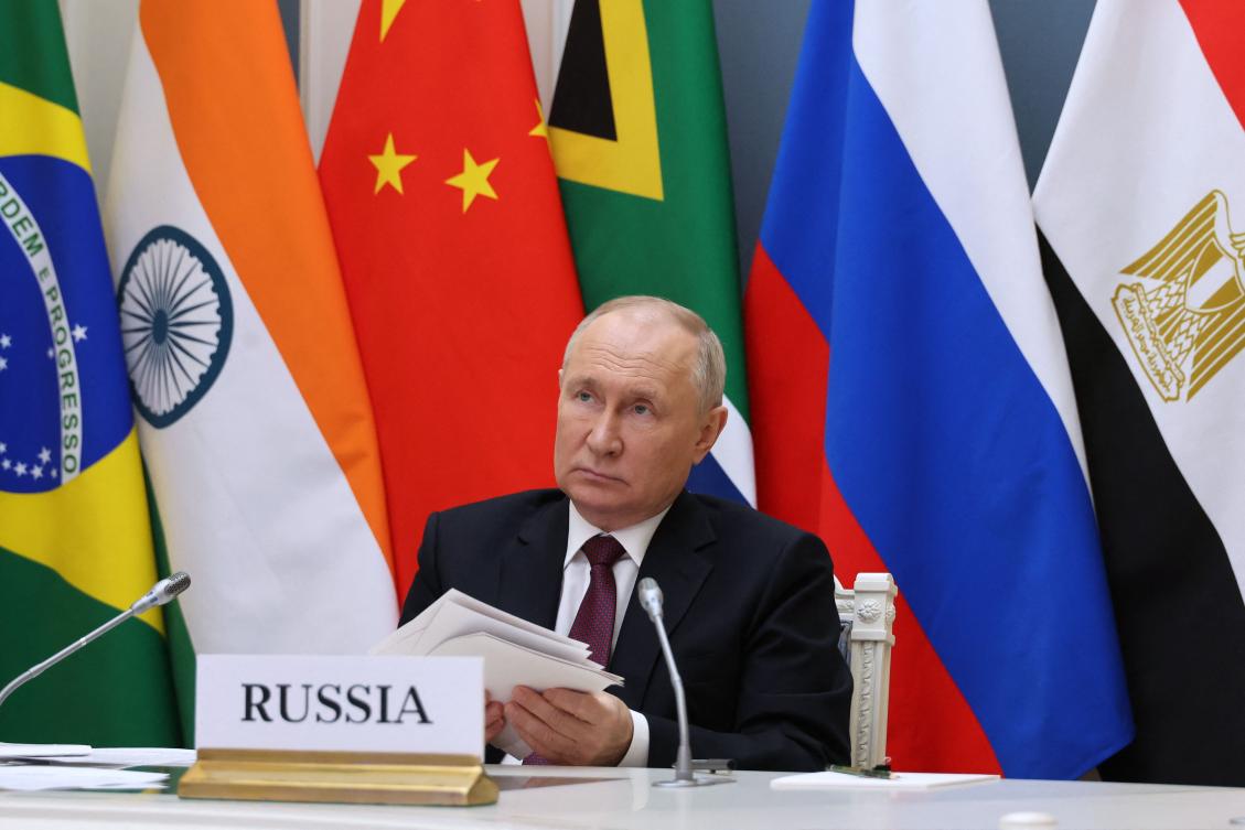 This pool photograph distributed by Russian state agency Sputnik shows Russia’s President Vladimir Putin attending a virtual summit of the BRICS group of nations to discuss the Israel-Hamas war, in Moscow on Nov. 21, 2023. (AFP)