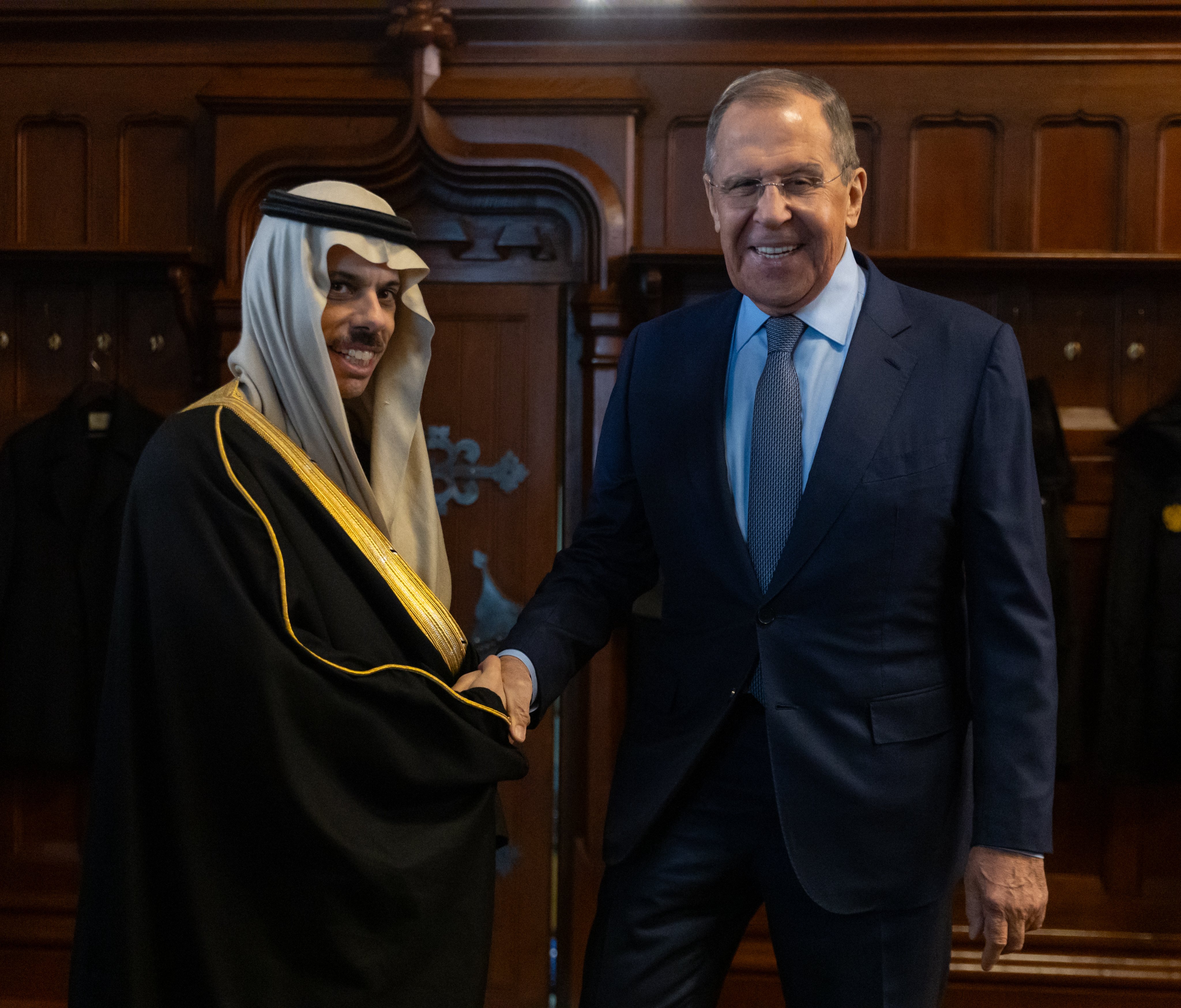 Saudi Arabia’s Foreign Minister Prince Faisal bin Farhan and Russian Foreign Minister Sergey Lavrov shake hands on Tuesday. (SPA)