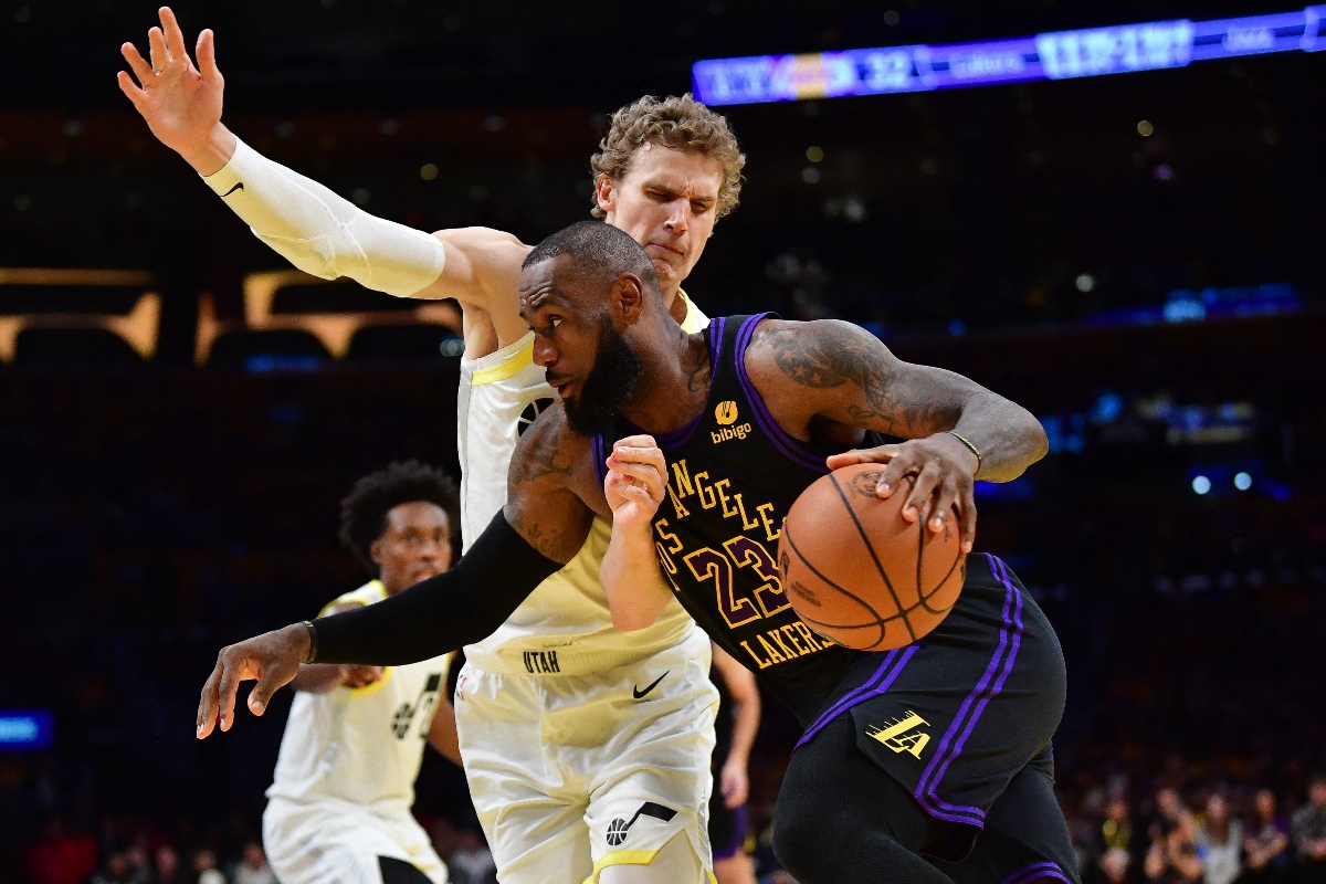 Los Angeles Lakers forward LeBron James moves to the basket against Utah Jazz forward Lauri Markkanen during the first half of their NBA game at Crypto.com Arena on Tuesday. (USA TODAY Sports)