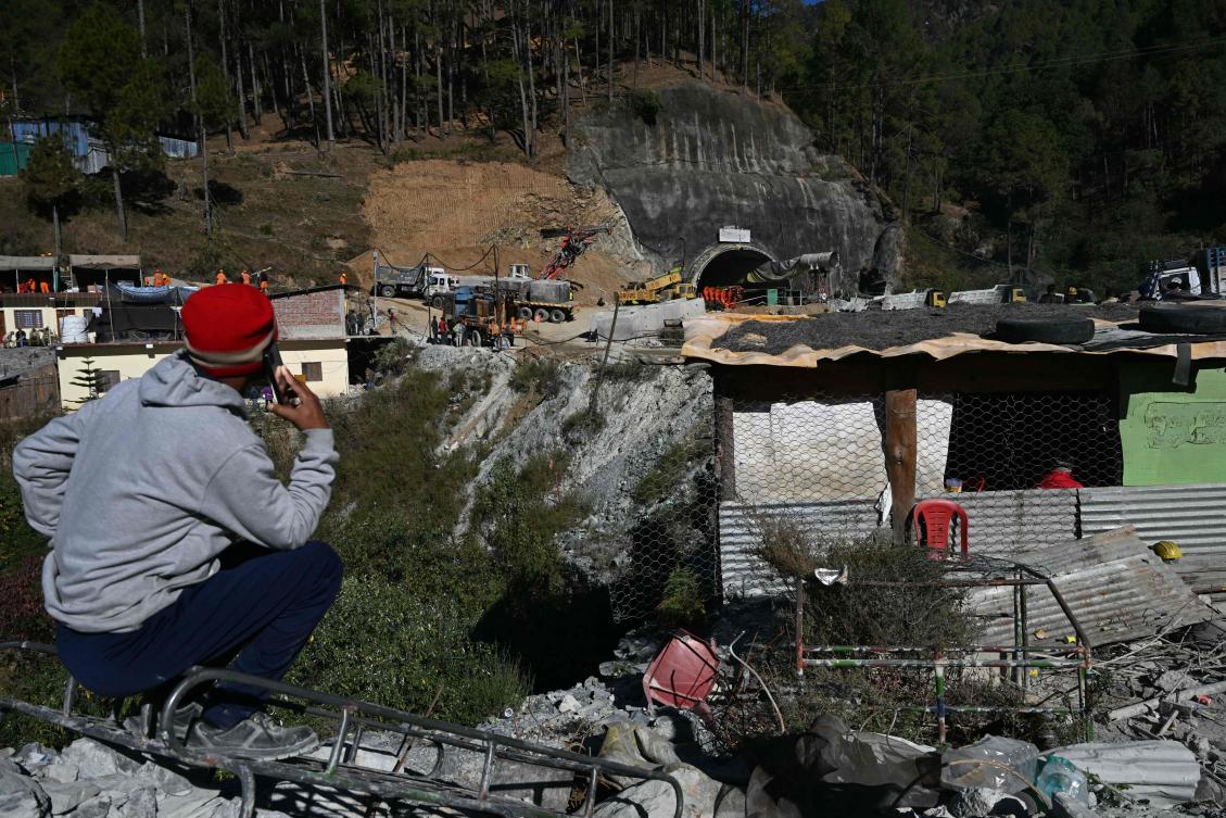 Teams are drilling in two directions in a bid to dig a rescue shaft nearly half a kilometer long to reach the 41 increasingly desperate men. (AFP)