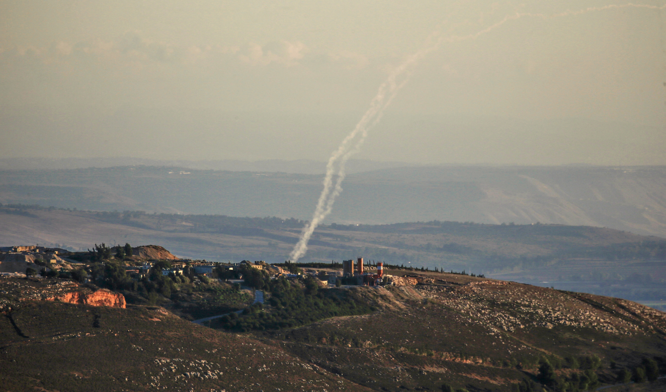 A picture taken from southern Lebanon near the eastern border with Israel shows rockets being fired by the Hezbollah group towards Israel on November 21, 2023. (AFP/File)