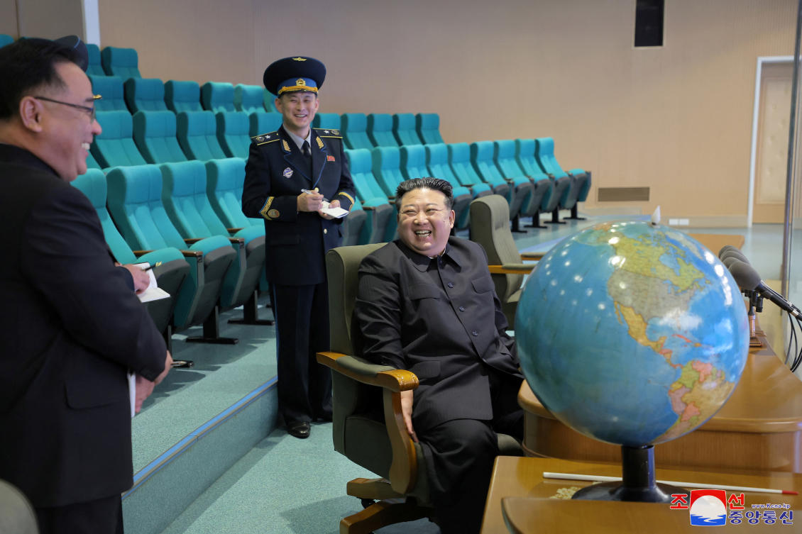 North Korea’s leader Kim Jong-un visits the Pyongyang General Control Center of the National Aerospace Technology Administration to inspect operational readiness of the reconnaissance satellites and view aerospace photographs. (Reuters)