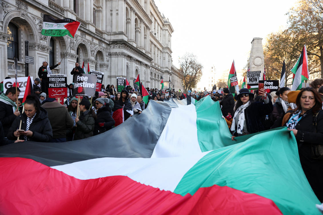 Demonstrators protest in Whitehall by The Cenotaph, during a protest in solidarity with Palestinians in Gaza, during a temporary truce between Hamas and Israel, in London on Nov. 25, 2023. (Reuters)