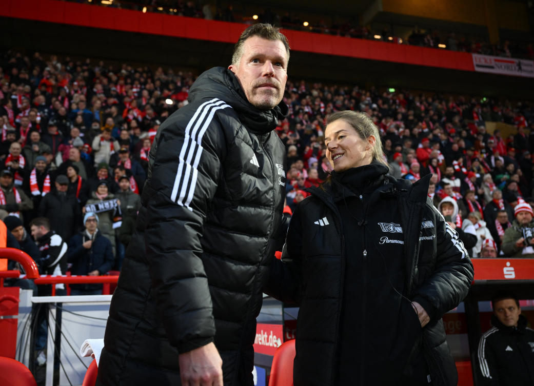 FC Union Berlin coach Marco Grote and assistant coach Marie-Louise Eta before their Bundesliga match against FC Augsburg at Stadion An der Alten Forsterei, Berlin on Nov. 25, 2023. (Reuters)