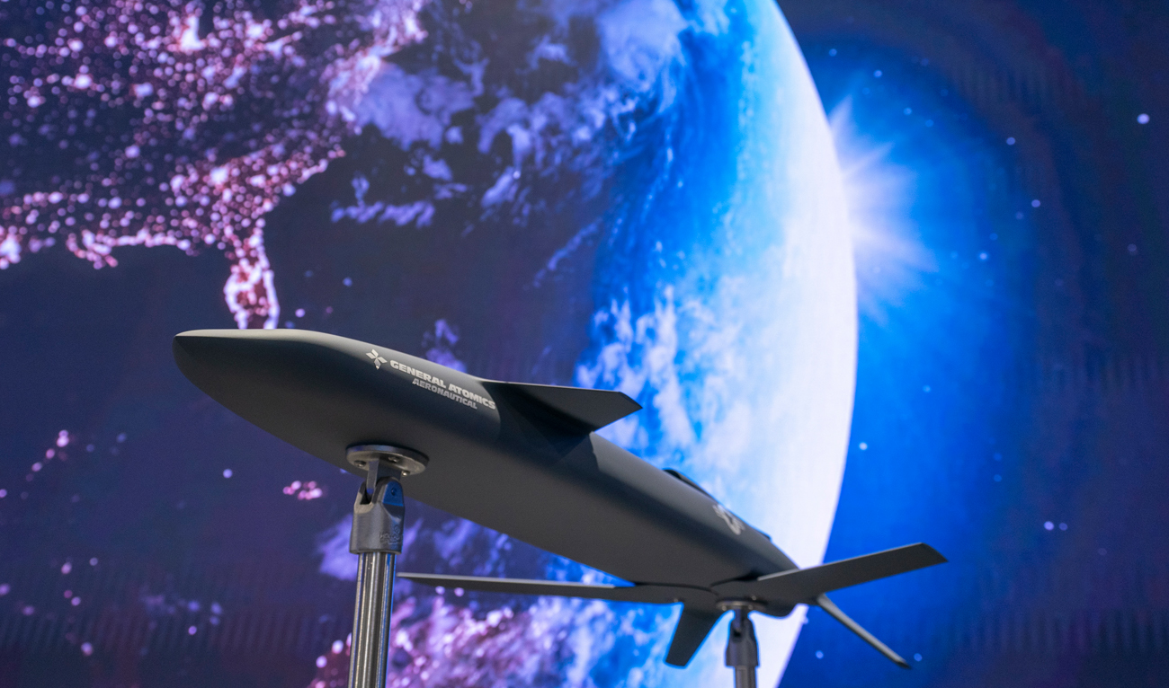The Longshot, an air-launched unmanned aircraft that General Atomics is developing with the Defense Advanced Research Project Agency for use in tandem with piloted Air Force jets, is displayed at the Air & Space Forces Association Air, Space & Cyber Conference, Wednesday, Sept. 13, 2023 in Oxon Hill, Md. (AP)