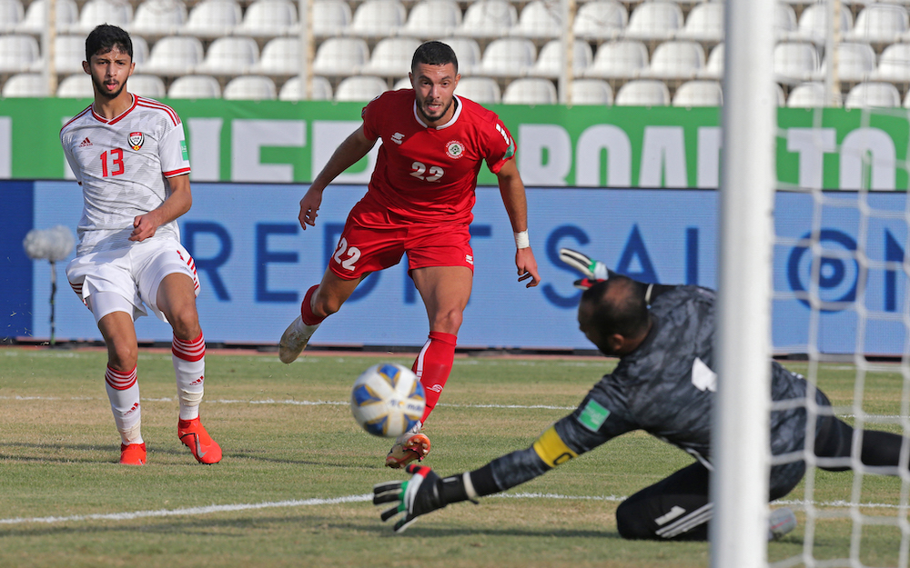 Denmark-born Bassel Jradi, center, had previously spent his entire career in Europe. Above, Jradi in action during the Qatar World Cup Asian Qualifiers on Nov. 16, 2021. (AFP file photo)