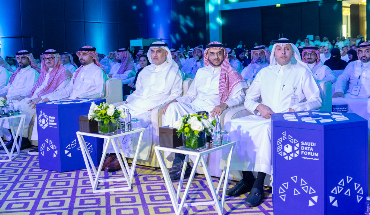 From right to left: Dr. Essam Al-Wequit, Prince Bandar bin Abdullah bin Mishari, and Dr. Abdullah Al-Ghamdi, leading the attendees at the Saudi Data Forum in Riyadh. (Supplied)