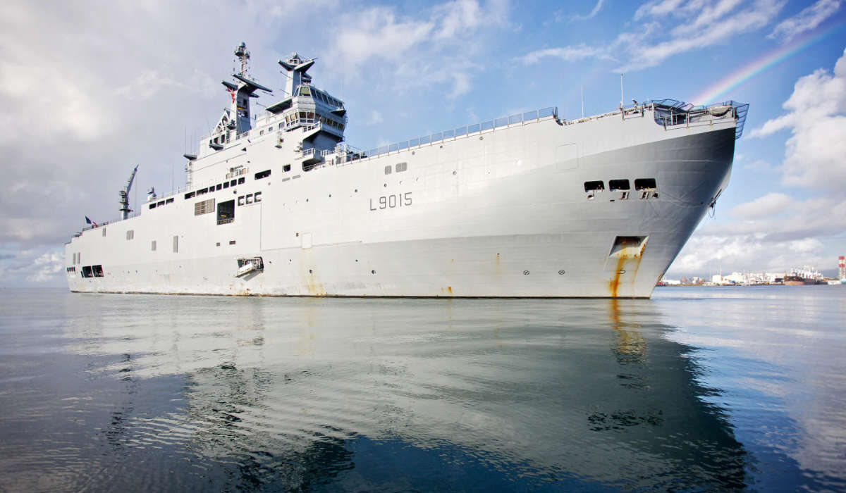 This photograph taken on on April 18, 2020 shows the hibious helicopter carrier (PHA) Dixmude arriving in the port of Point-a-Pitre, on the French Carribean archipelago of Guadeloupe. (AFP)
