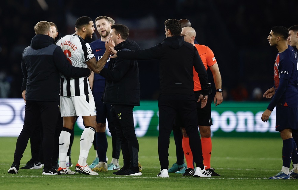 Newcastle United’s Jamaal Lascelles remonstrates to referee Szymon Marciniak after the match. (Reuters)