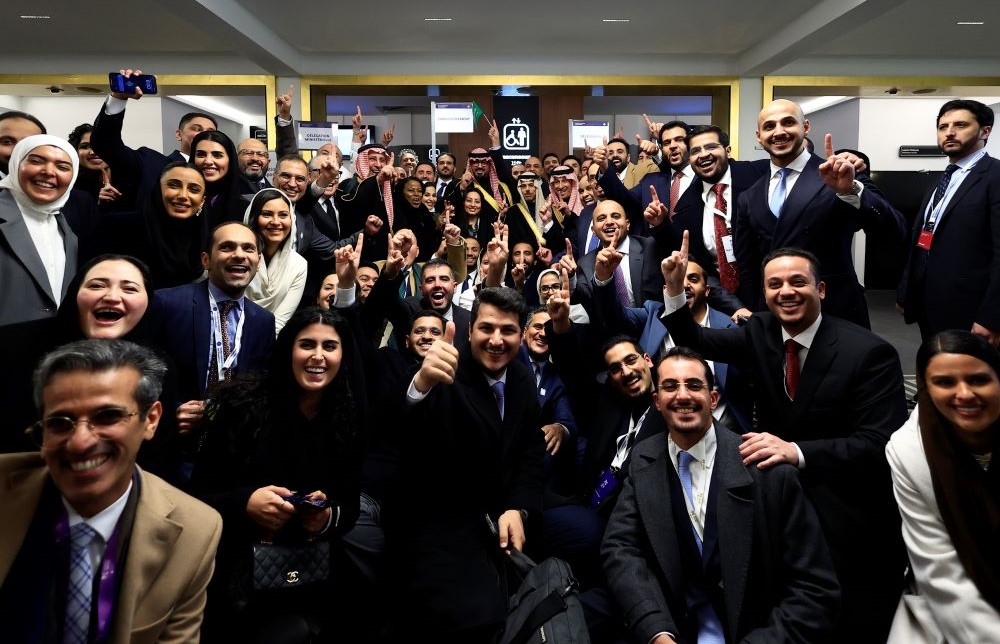 Members of the Saudi delegation celebrate after the Bureau International des Expositions, or BIE, announced the vote, Tuesday, Nov. 28, 2023, in Issy-les-Moulineaux, outside Paris, France. (AP Photo)