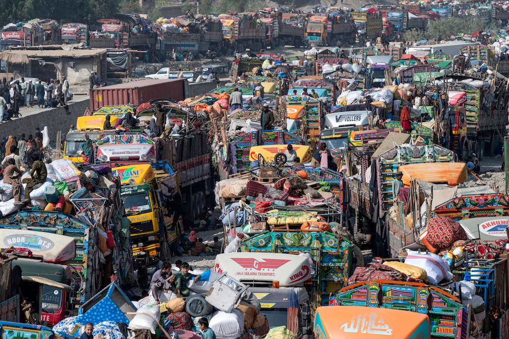 Afghan refugees arrive in trucks from Pakistan at the Afghanistan-Pakistan Torkham border in Nangarhar province on October 30, 2023. (AFP)