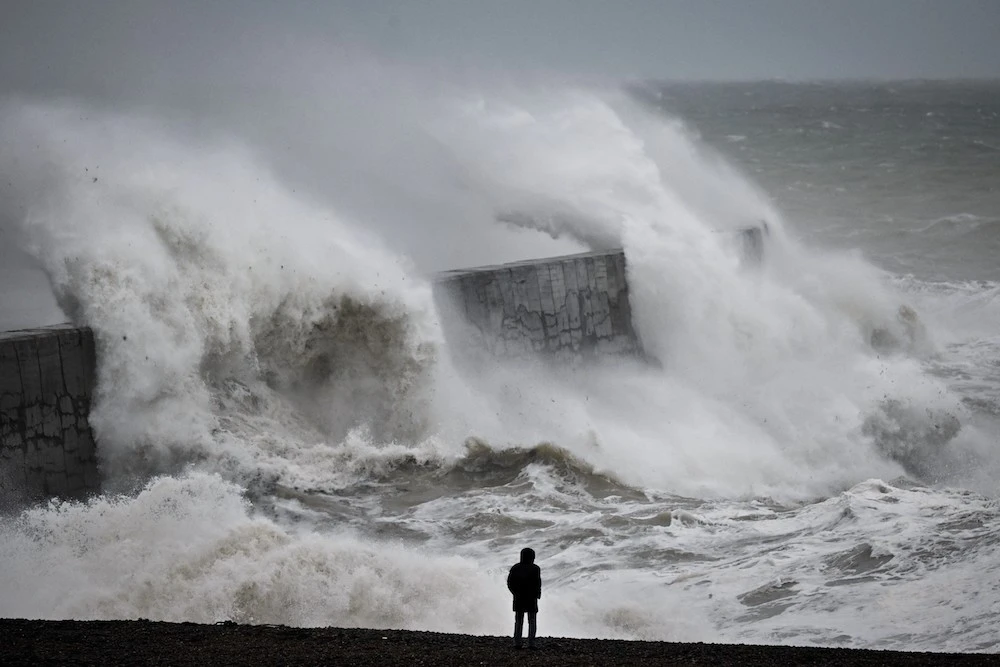 Waves crash the harbor wall in Newhaven, southern England on November 2, 2023 during Storm Ciaran. (AFP)
