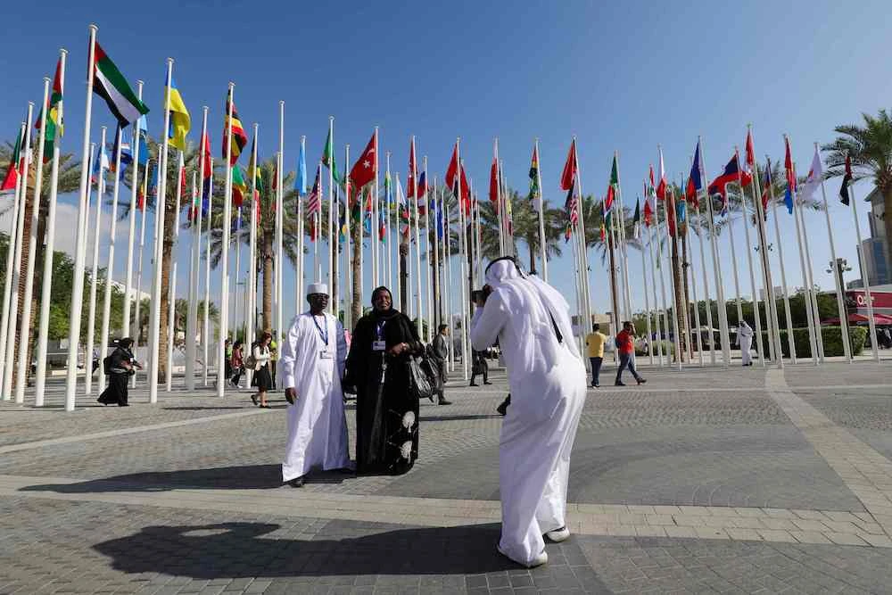Delegates have their pictures taken at the venue of the COP28 United Nations climate summit in Dubai on Nov. 30, 2023. (Reuters)