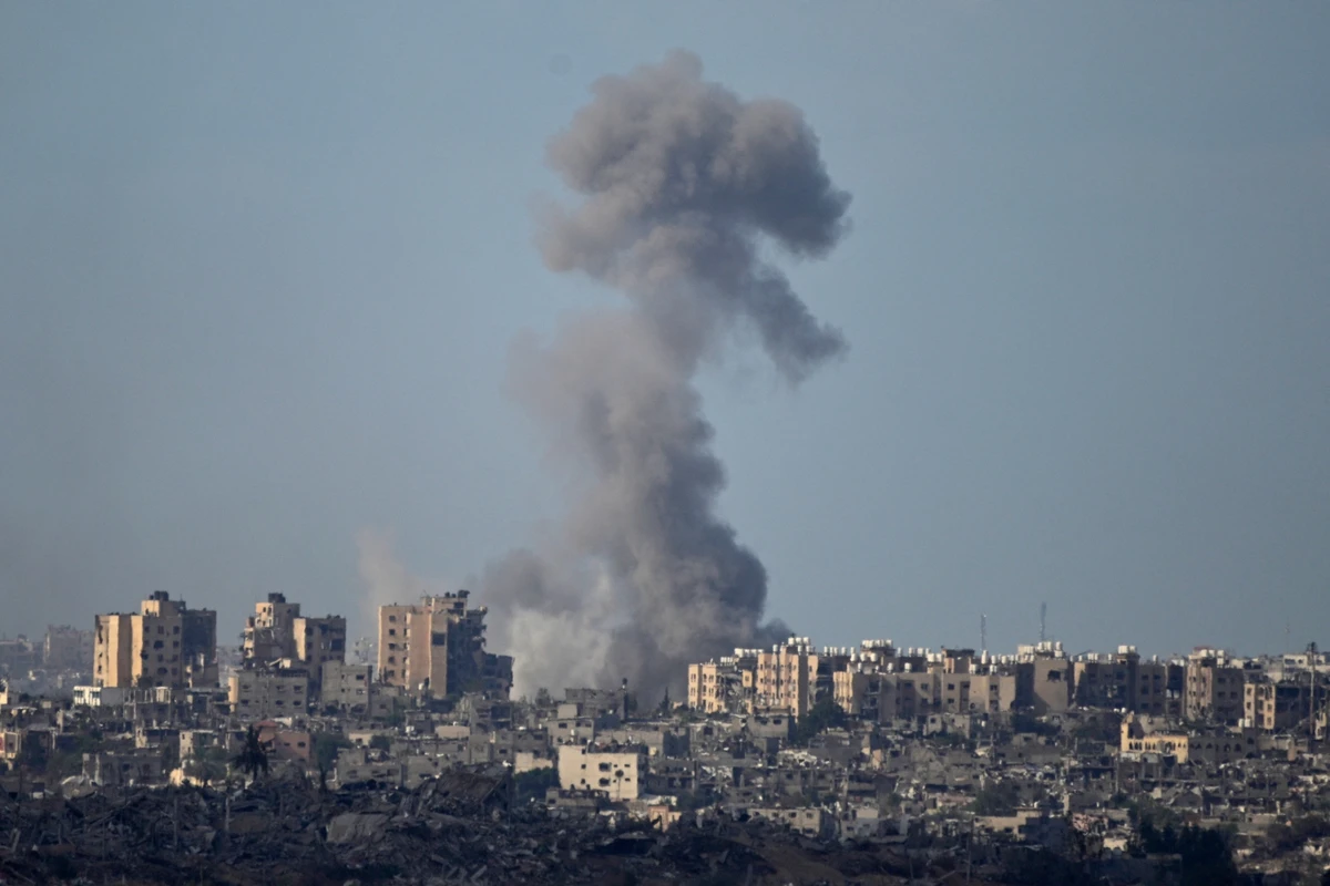 Supporting a ceasefire is simply a desperate call to stop the killing and suffering of those caught up in this war (AFP)