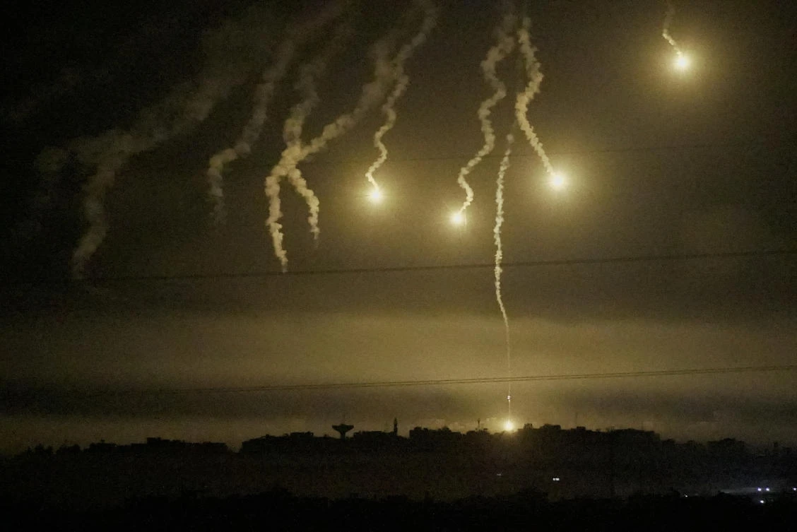 Flares are pictured over Gaza Strip, seen from southern Israel (REUTERS)