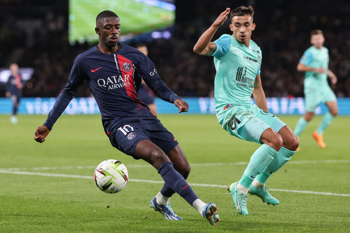 Paris Saint-Germain's French forward Ousmane Dembele (L) and Montpellier's French defender Theo Sainte-Luce during the French L1 football match between Paris Saint-Germain (PSG) and Montpellier Herault SC at The Parc des Princes Stadium in Paris on Friday. (AFP)