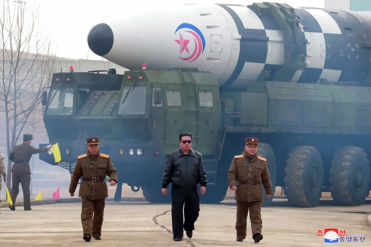North Korean leader Kim Jong Un, center, walks around what a Hwasong-17 intercontinental ballistic missile (ICBM) on the launcher at an undisclosed location in North Korea on March 24, 2022. (Korean Central News Agency/via AP, File)