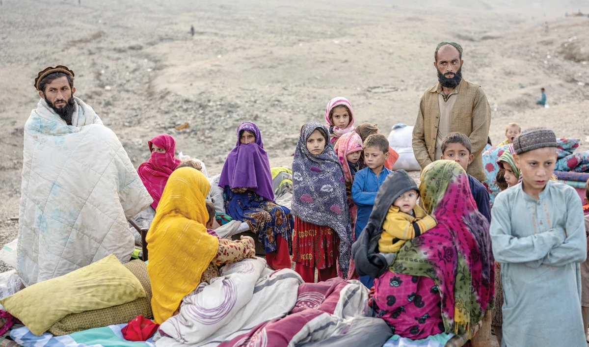Afghan refugees settle in a camp near the Torkham Pakistan-Afghanistan border in Torkham, Afghanistan, on Saturday. (AFP)