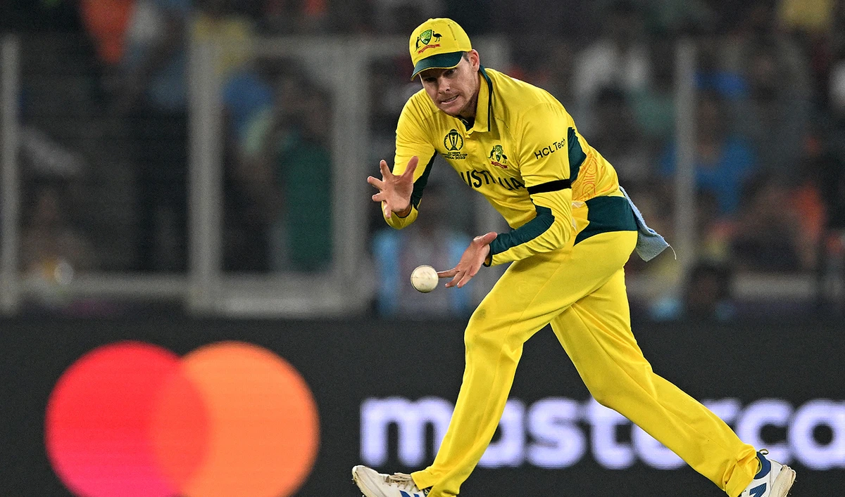 Australia's Steve Smith fields the ball during the 2023 ICC Men's Cricket World Cup one-day international (ODI) match between England and Australia at the Narendra Modi Stadium in Ahmedabad on November 4, 2023. (AFP)
