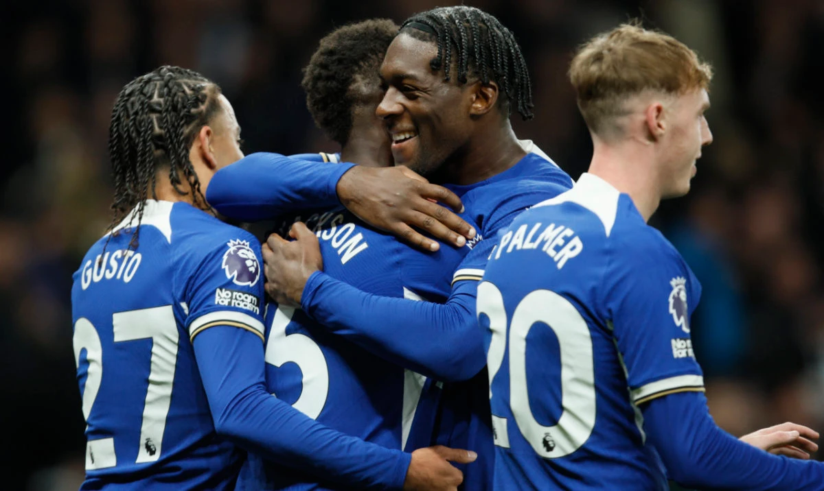 Chelsea's Nicolas Jackson celebrates with Chelsea's Lesley Ugochukwu after scoring his side's fourth goal during the English Premier League soccer match between Tottenham Hotspur and Chelsea, at Tottenham Hotspur Stadium, London, Monday, Nov. 6, 2023. (AP)
