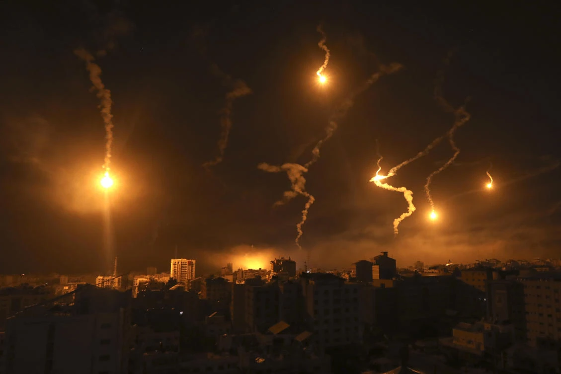 Flares fired by Israeli forces light up the night sky in Gaza City, on Nov. 6, 2023. (AP)