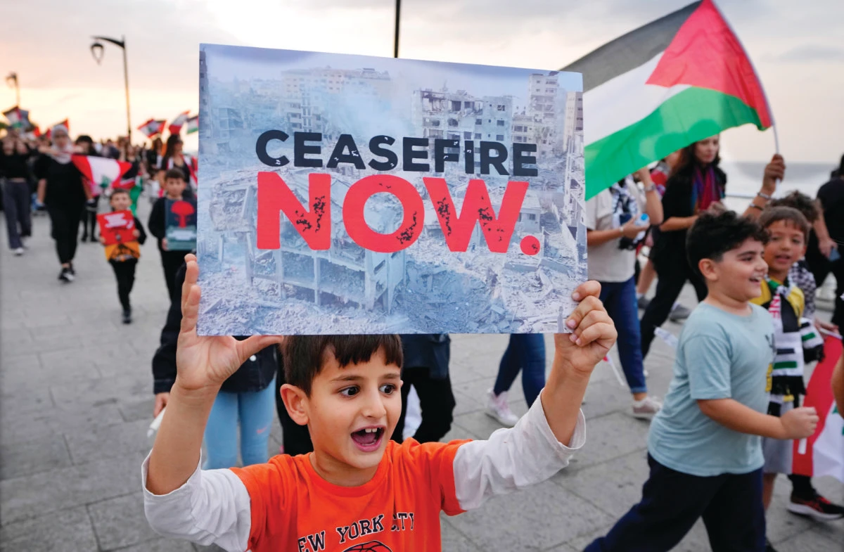 Protesters march on the Mediterranean Sea corniche in Beirut. (AP)