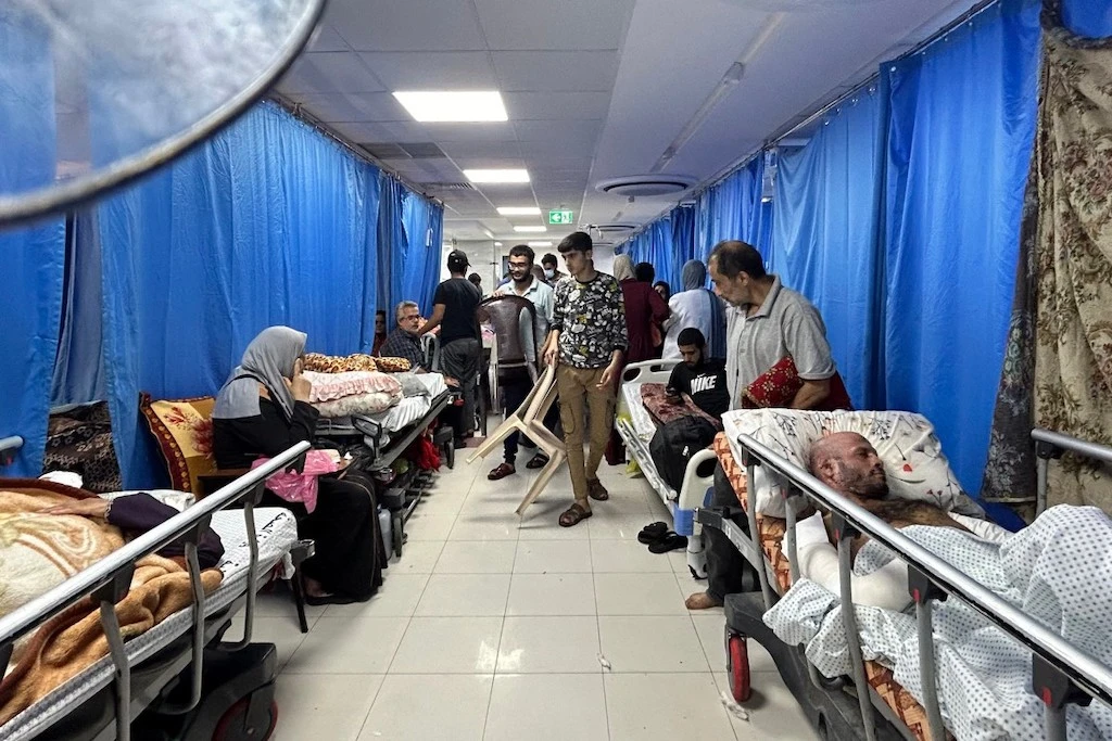 Patients and internally displaced people are pictured at Al-Shifa hospital in Gaza City on November 10, 2023, amid ongoing battles between Israel and the Palestinian Hamas movement. (AFP)